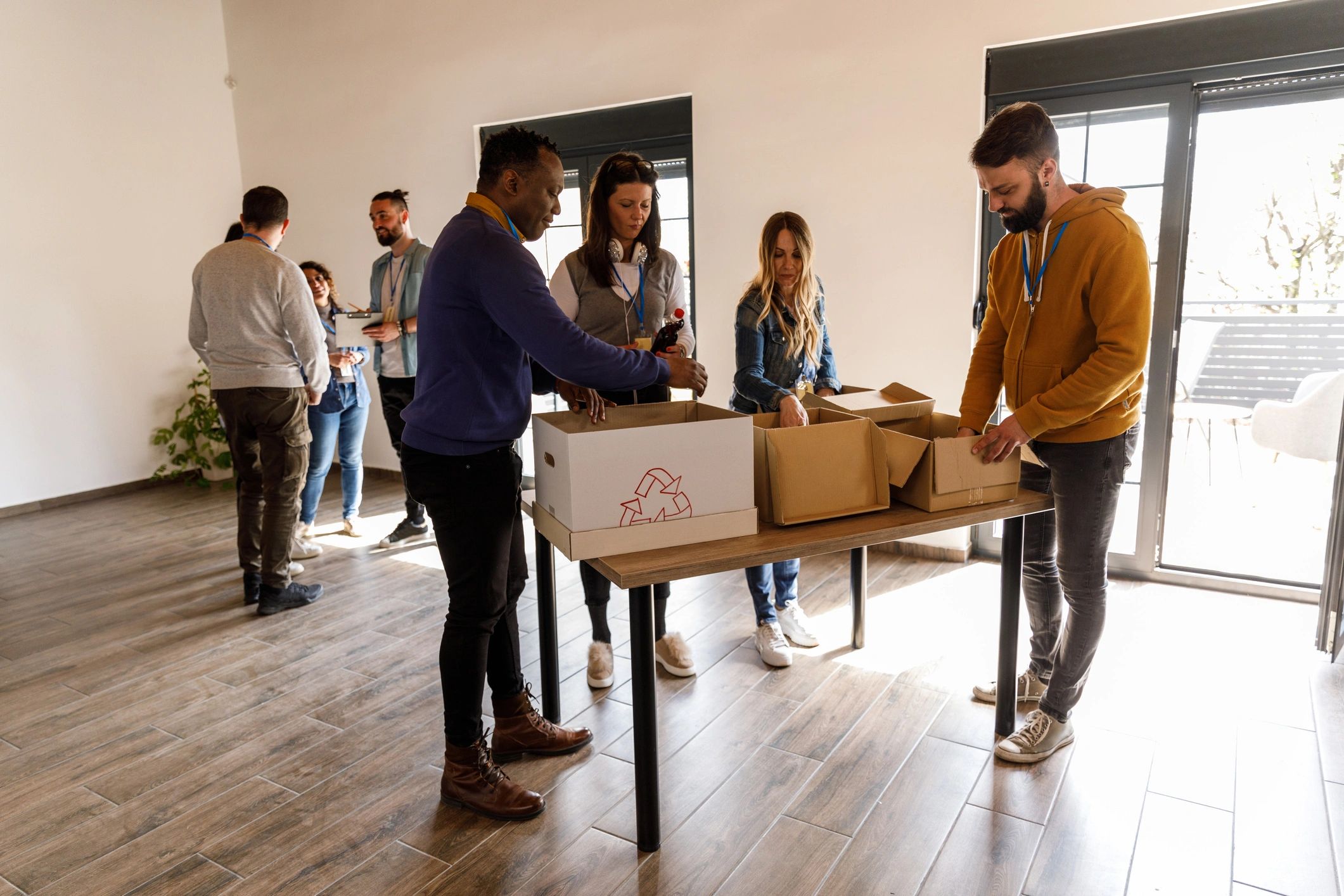 Team coordinating boxes during an office move