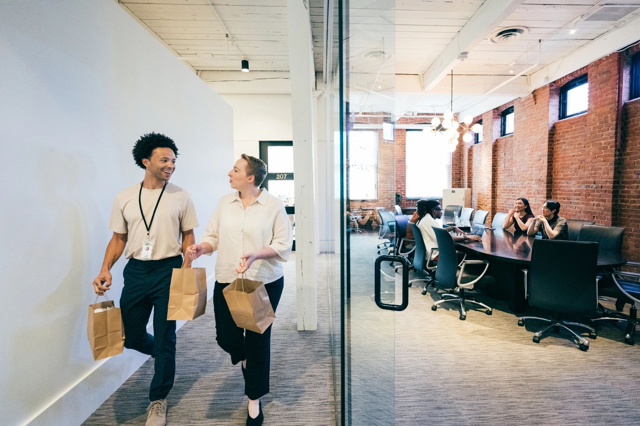 Business team in office environment representing coordinated commercial moving
